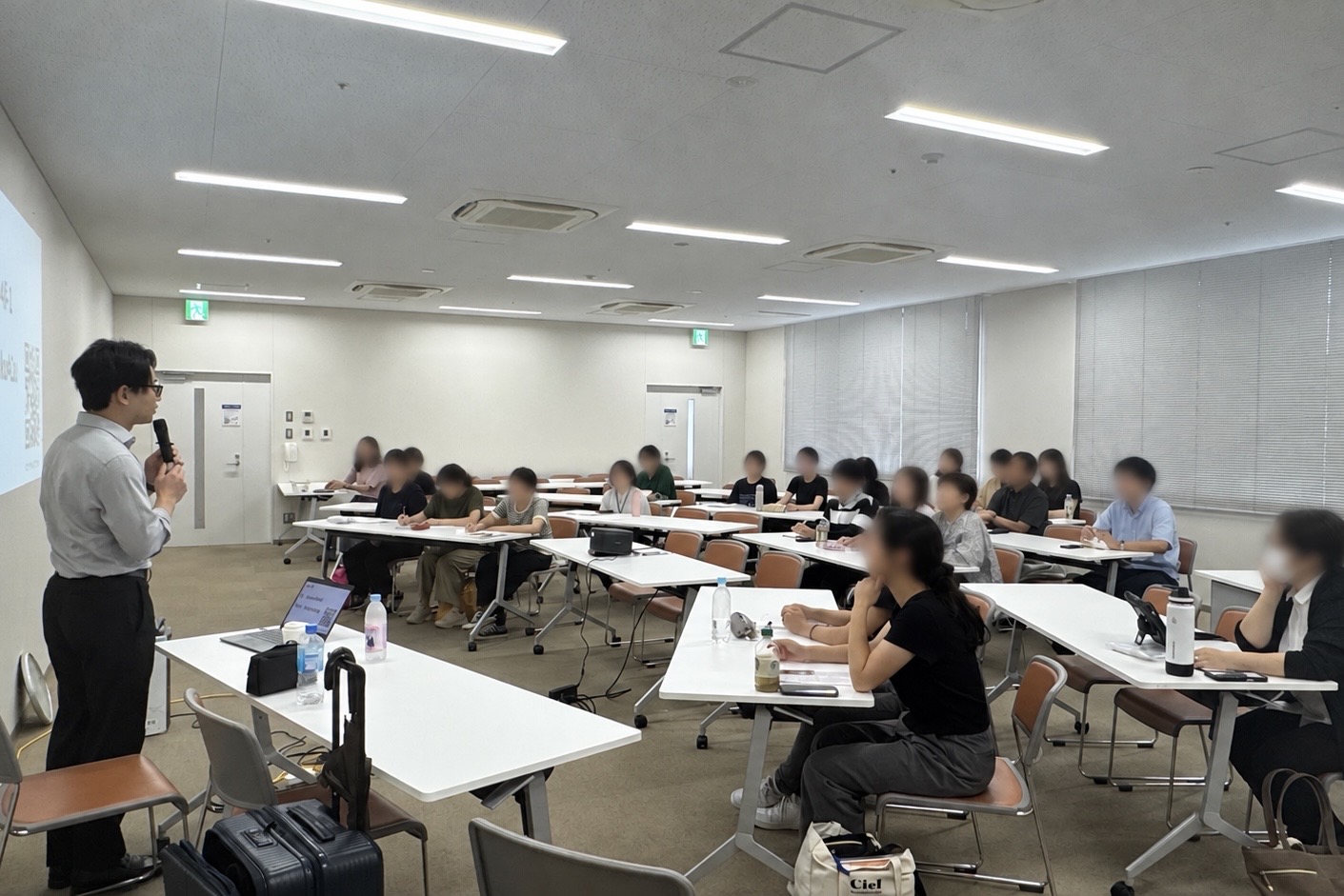 滋賀県私立保育園連盟主催「保育AI ヒナリー活用研修」で保育AI「hinary（ヒナリー）」について講演する弊社代表の池田